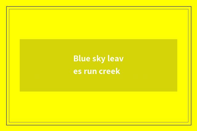 Blue sky leaves run creek
