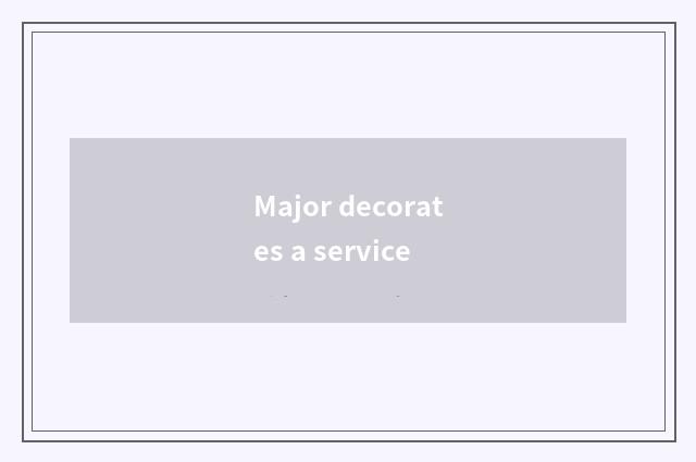 Major decorates a service